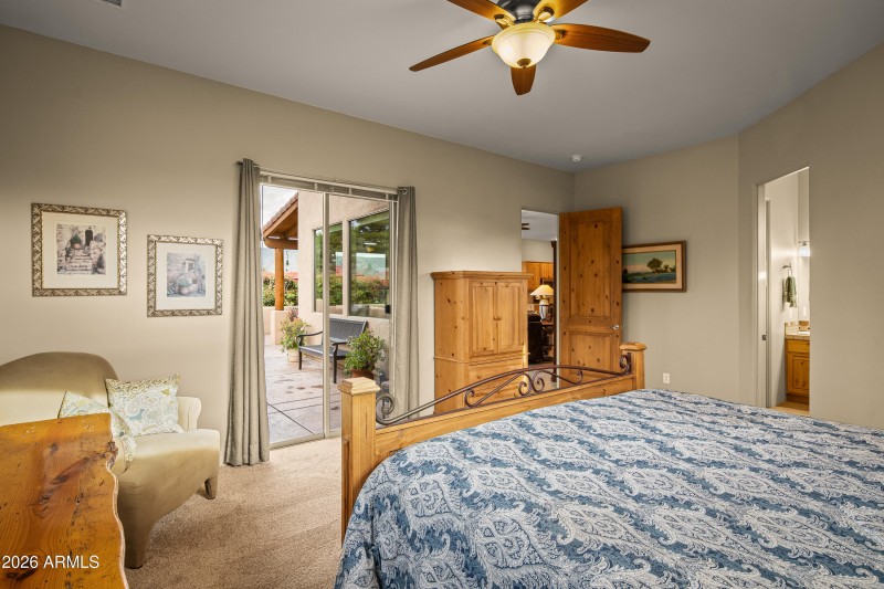 PRIMARY BEDROOM WITH PATIO ACCESS