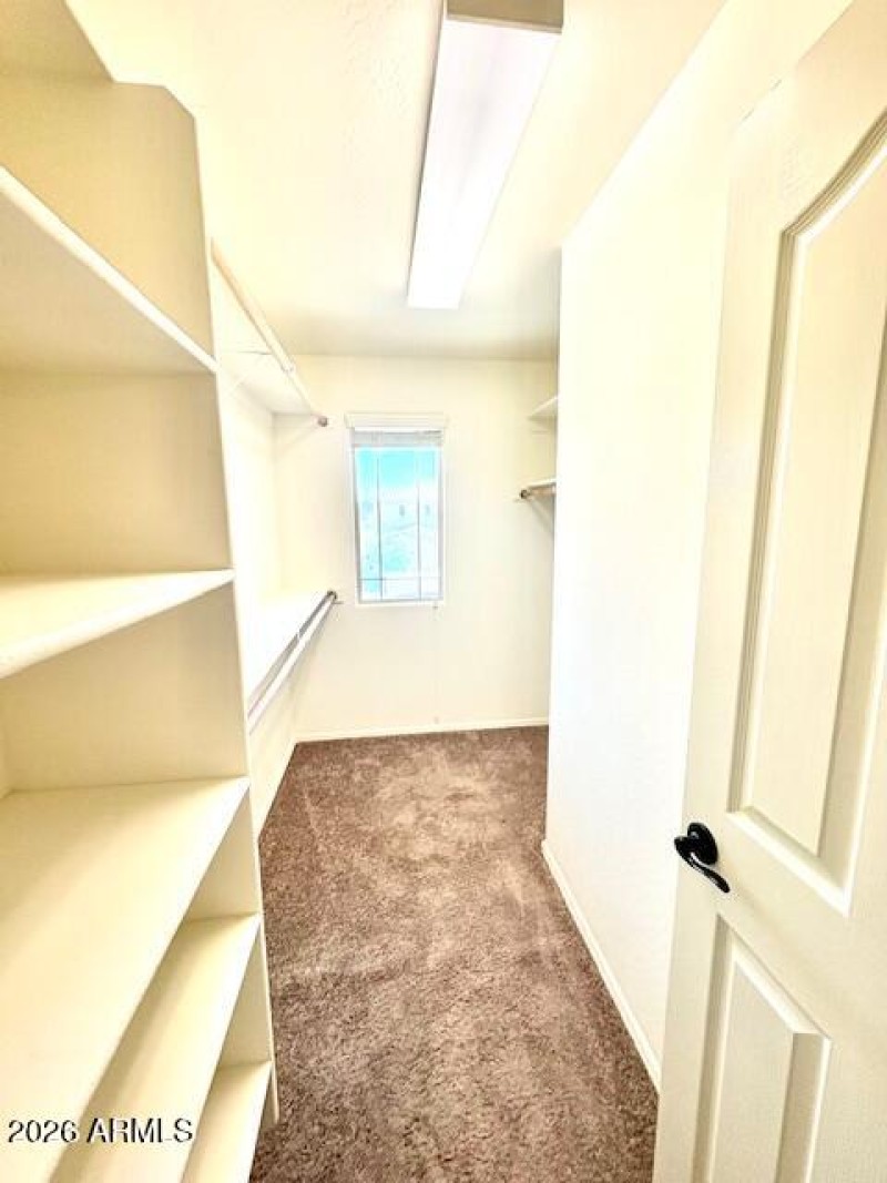 Primary "Hers" closet