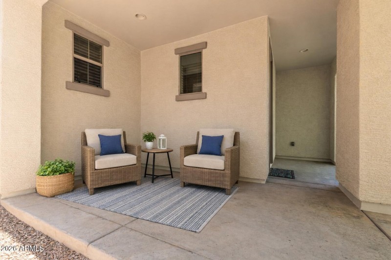 Cozy entryway with wicker seating