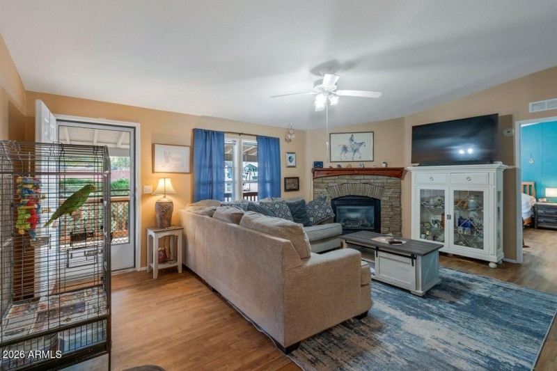 Spacious Living Room with Vaulted Ceilin