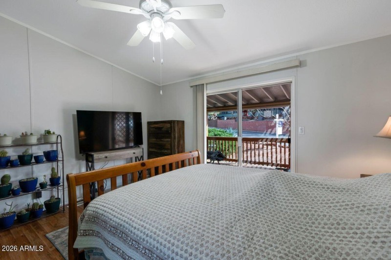 Primary Bedroom with outside access to c