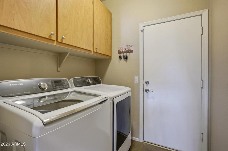Laundry room with storage cabinets