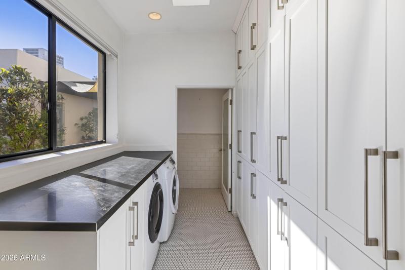 Laundry Area within Primary Bath