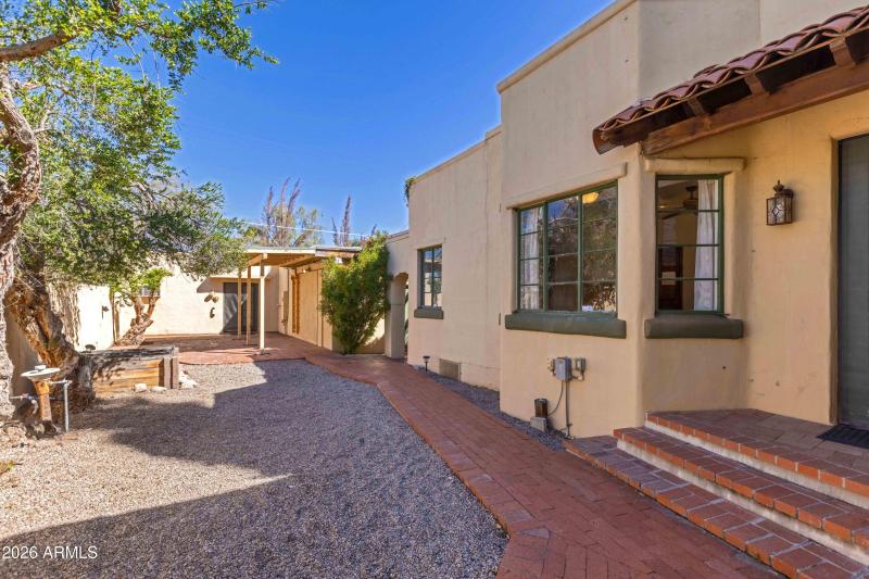 Side Entry to and Yard of Main House on