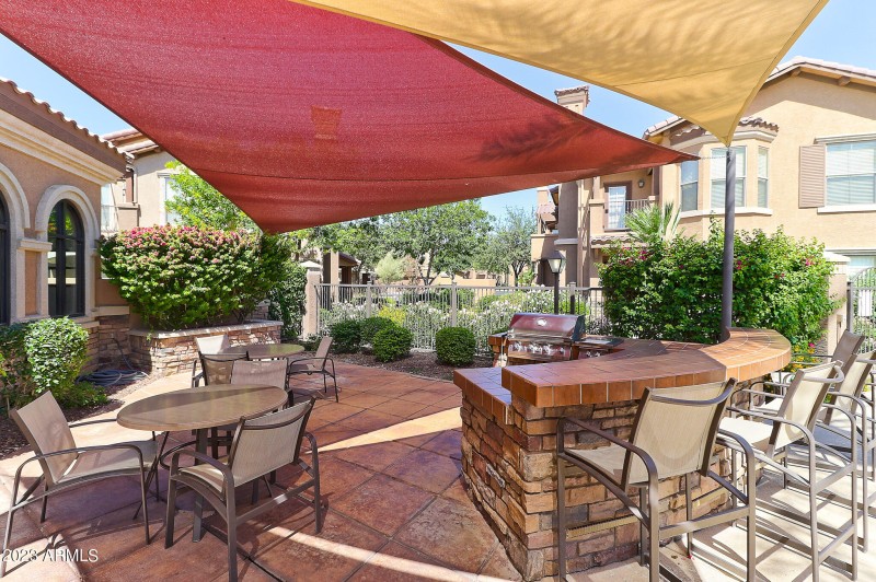 Gas BBQ and shaded seating area