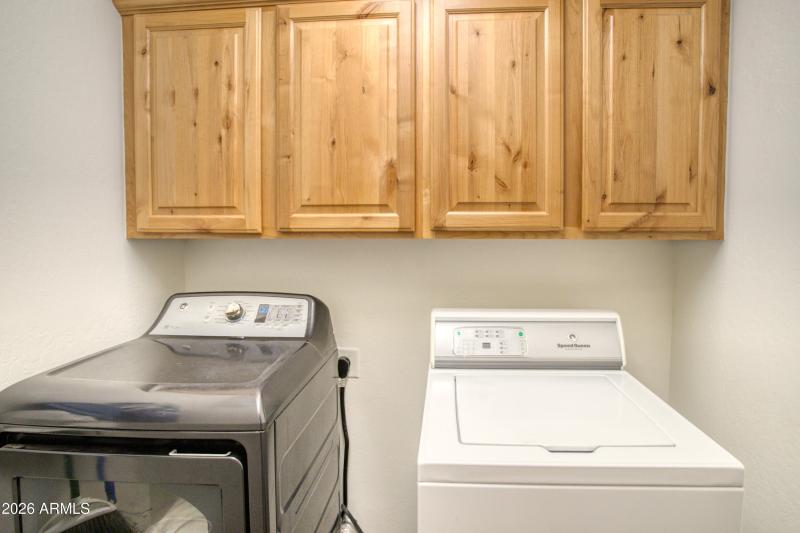 Laundry room with built in cabs