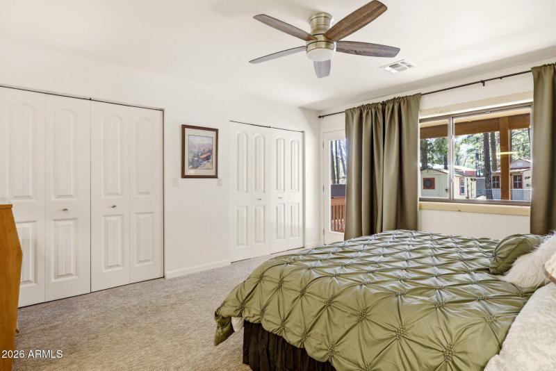 Primary bedroom with access to back deck