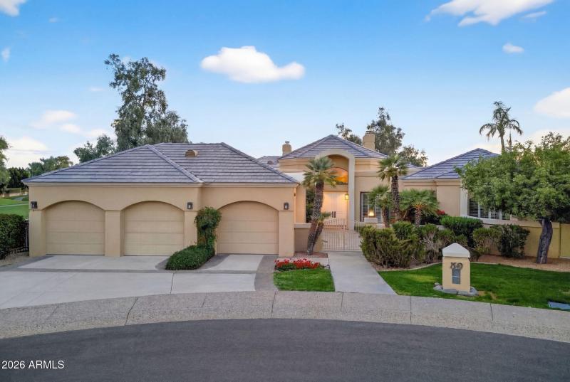 Front view and 3 car garage