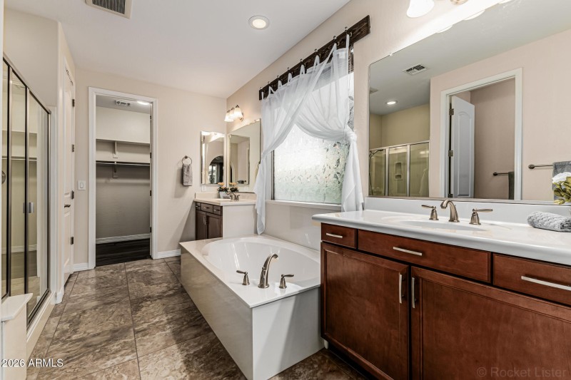 Primary Bathroom separate tub and shower