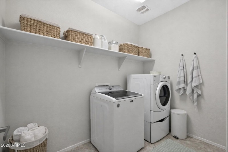 V stage washer dryer room