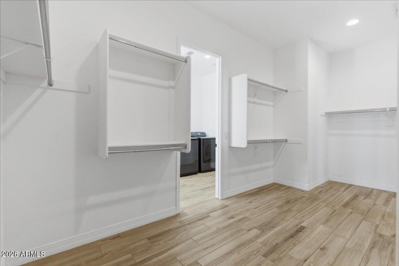 Primary Closet connects to Laundry room