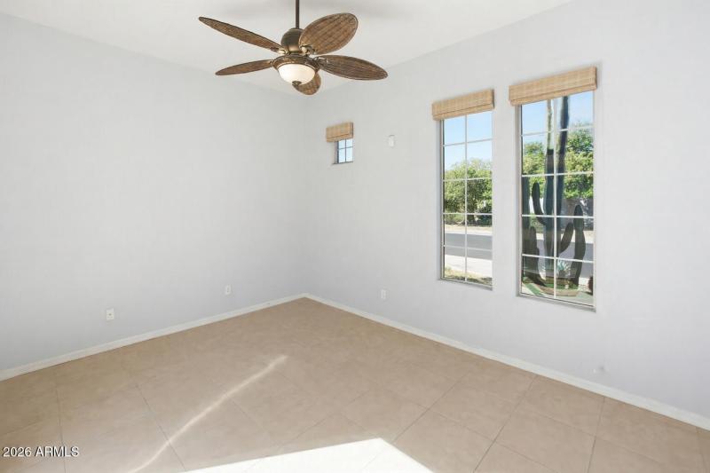 Bright, tranquil room with bamboo shades