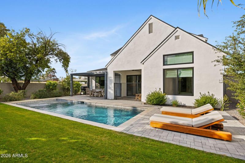 Pool, Covered Patio & Lush Landscape