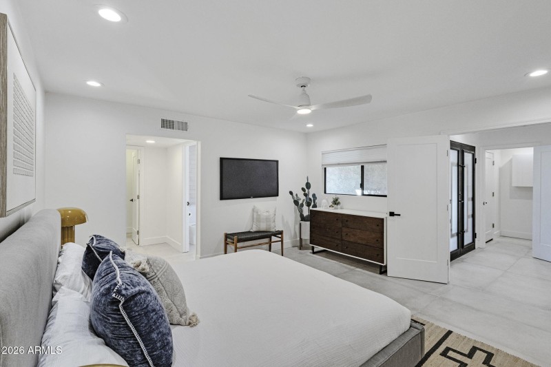 Primary Suite off the entry foyer.