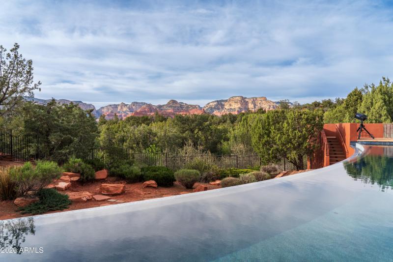 NEGATIVE EDGE POOL RETILED & RESURFACED