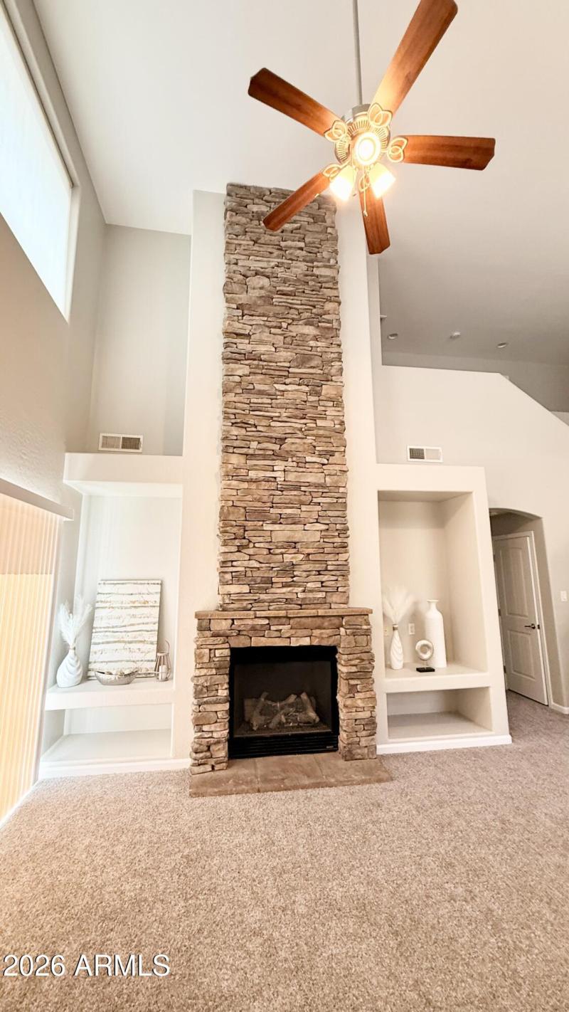 Soaring stone gas fireplace