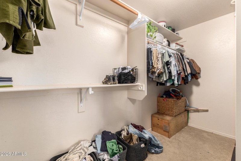 15 - Downstairs Primary Walk-in Closet