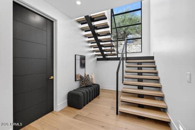 Floating Staircase with Door to Office