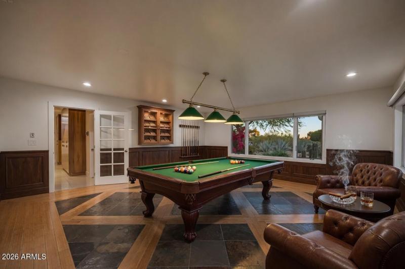 Game on. Cigars lit. Drinks poured.