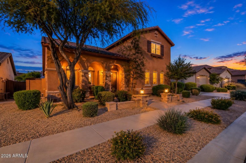 Twilight glow over desert-style home