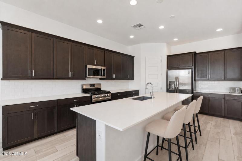 kitchen with breakfast bar seating