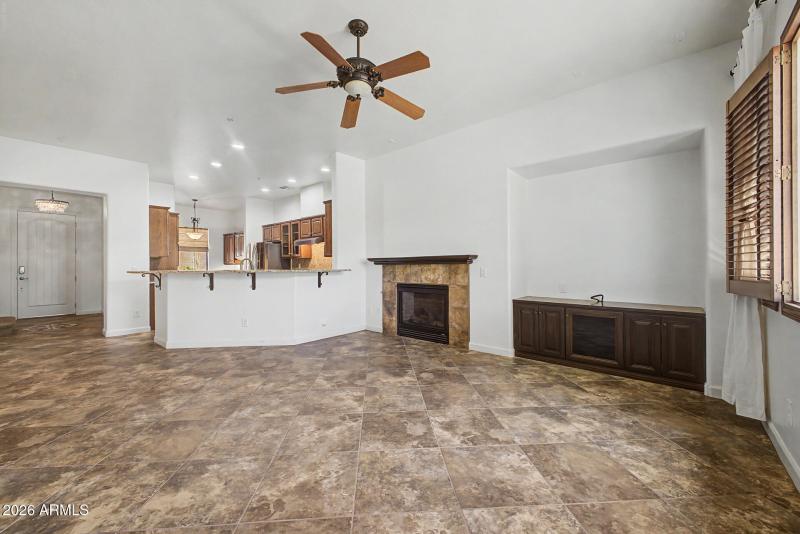GREATROOM WITH FIREPLACE OPEN TO KITCHEN