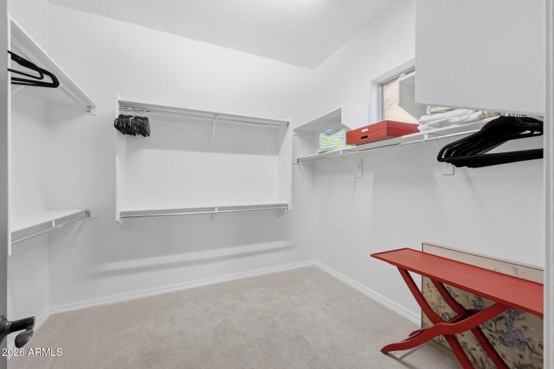 GENEROUS PRIMARY CLOSET