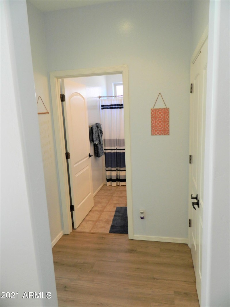 CB SOLA HALL TO GUEST BATHROOM AND BEDRO