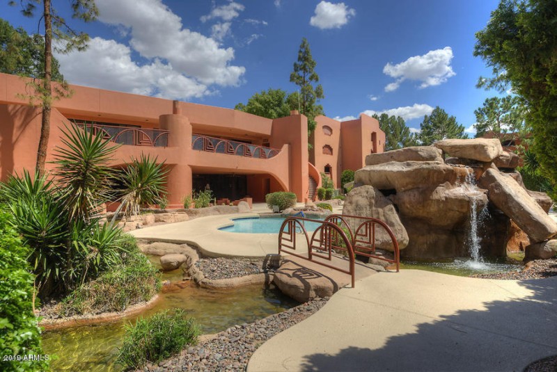 PRISTINE WATERFALL AND CLUBHOUSE