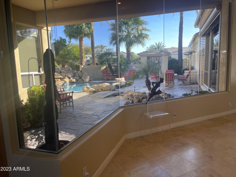 DINING ROOM WINDOWS TO POOL COURT YARD