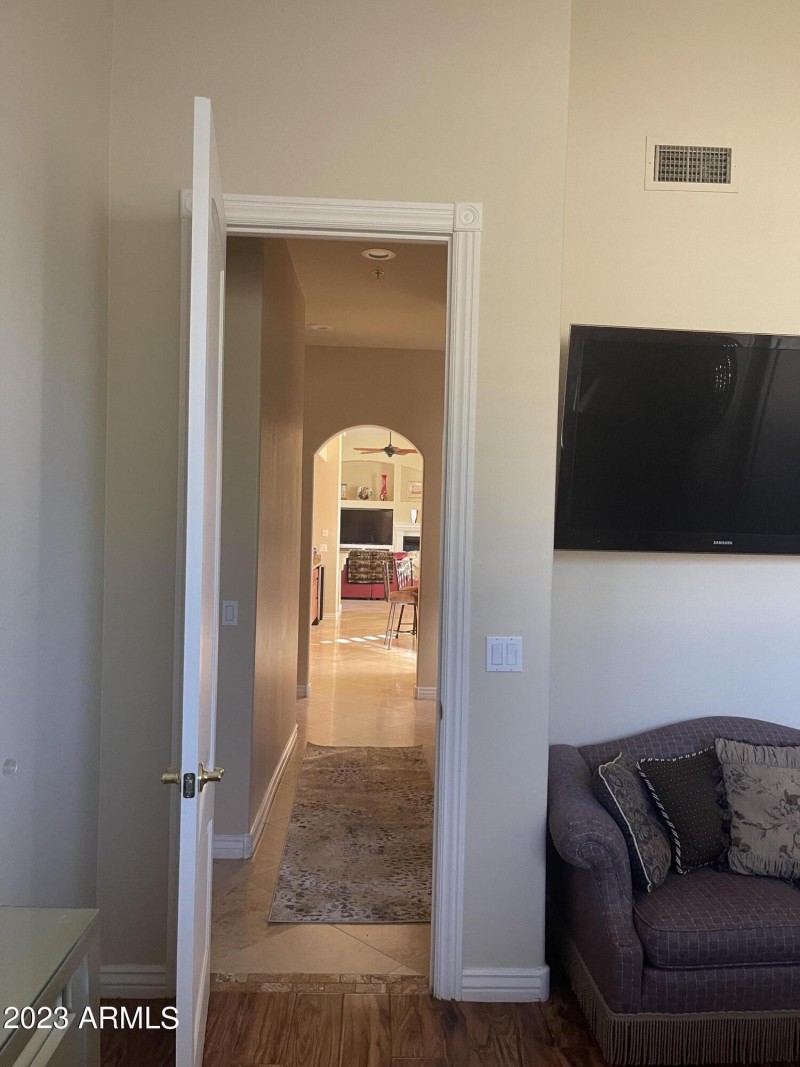 LOOKING DOWN HALL TO KITCHEN/LIVING RM