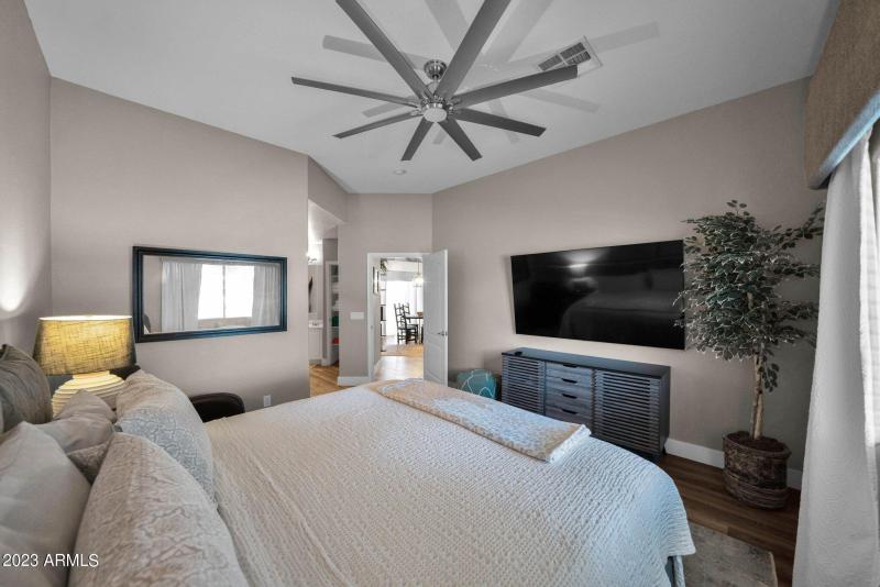 Master bedroom with huge screen TV