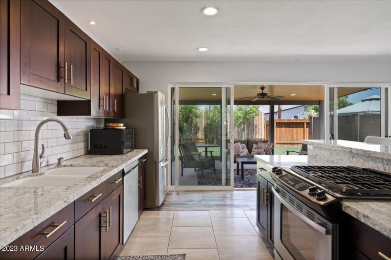 Kitchen with view of backyard
