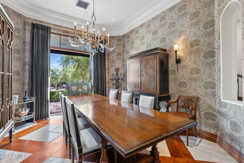 elegant dining with doors to courtyard