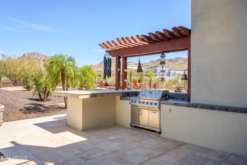 Outdoor Kitchen With Custom Built Bar