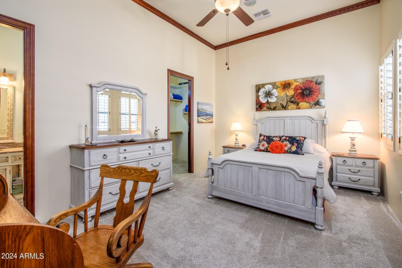 En Suite Bedroom With Wood Crown Molding