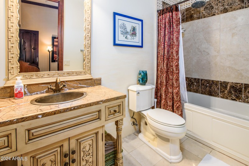 Full Bathroom With Custom Cabinetry