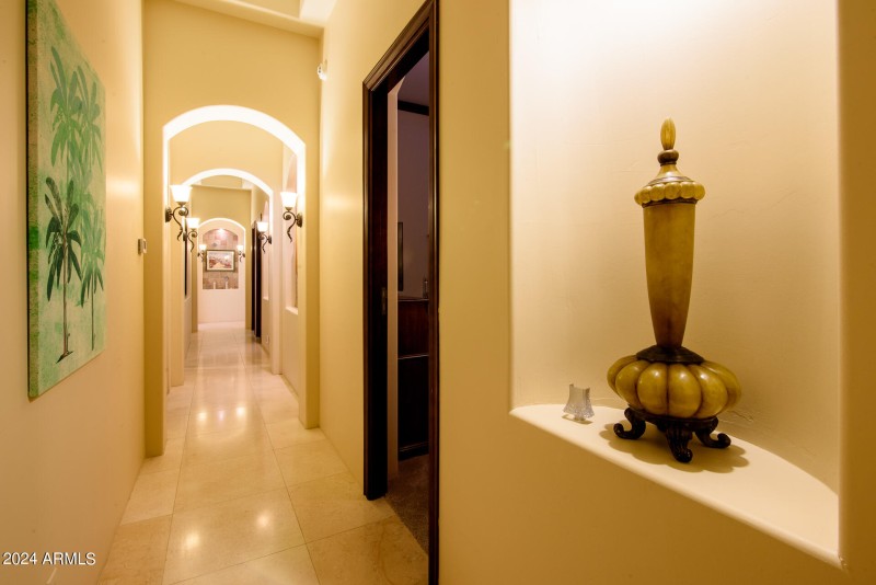 Long Arched Hallway With 12' Ceilings