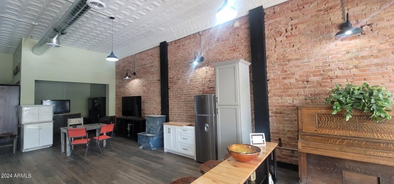 1113 G Ave brick wall and lights