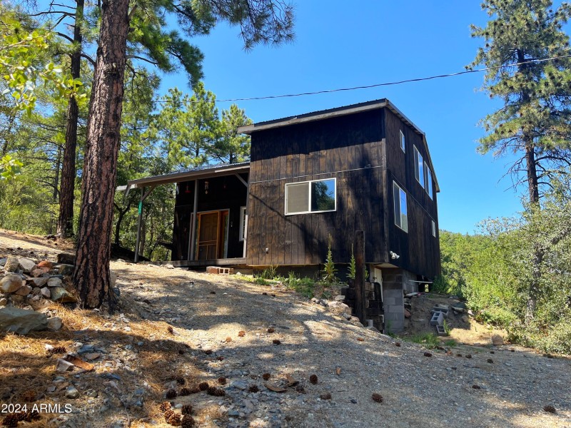 Cabin nestled high on a hill