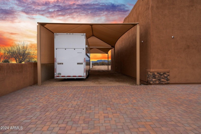 Covered area next to garage