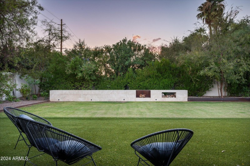 Grassy Backyard with Fire Feature