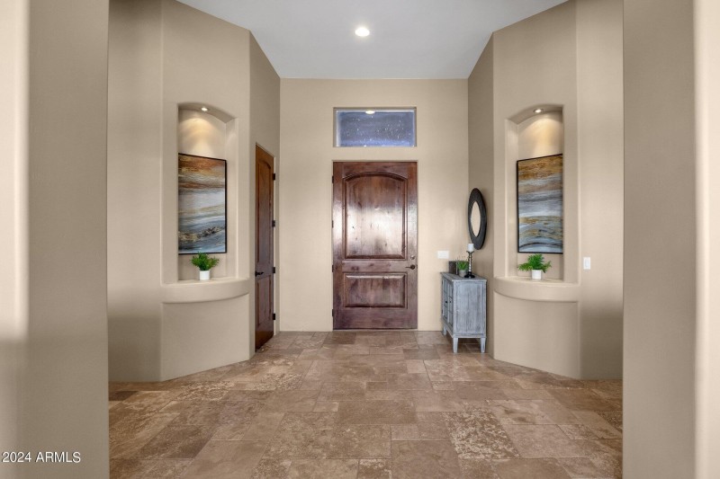 FOYER W/ LIGHTED ART NICHES