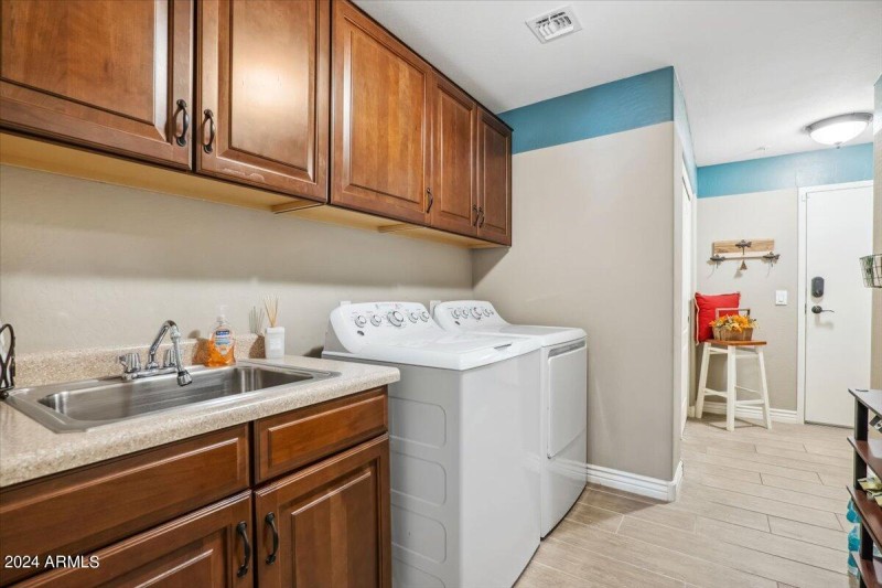 Laundry Room with Sink and Cabinetry