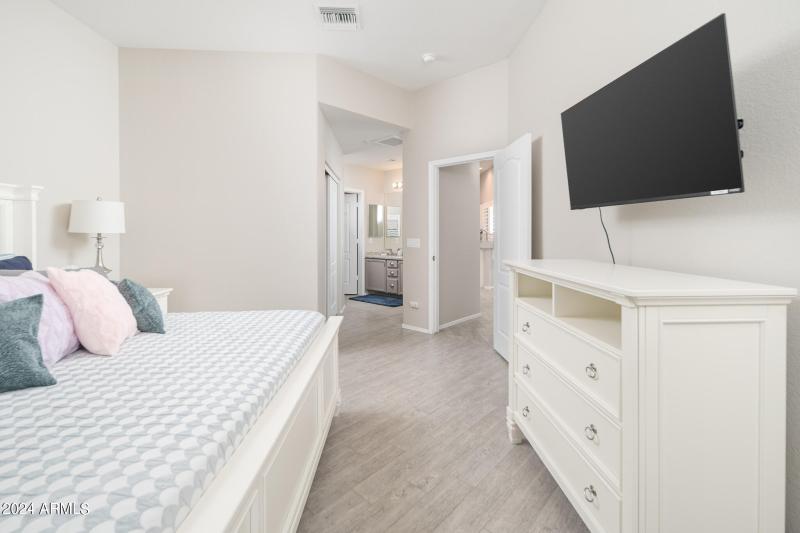 Primary Bedroom w/ King & TV