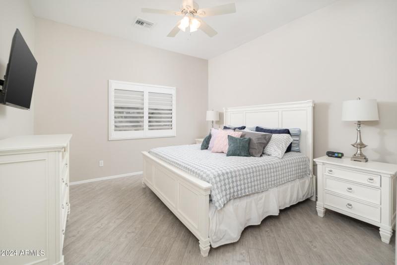 Primary Bedroom w/ King & TV