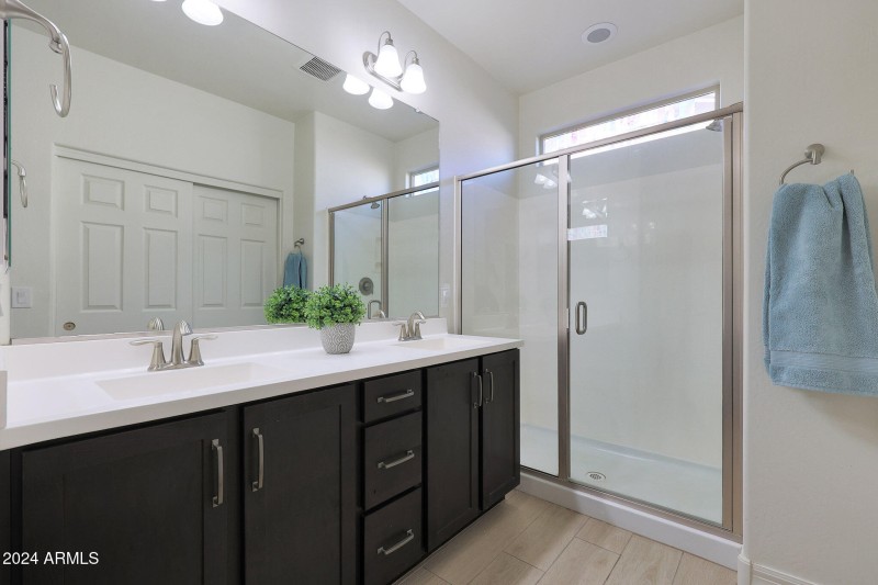 Dual Sinks & Walk-In Shower in Primary