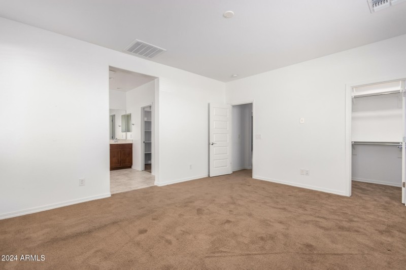 Master bedroom with 1st walk-in closet