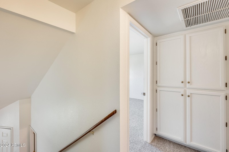 Upstairs hallway w/storage