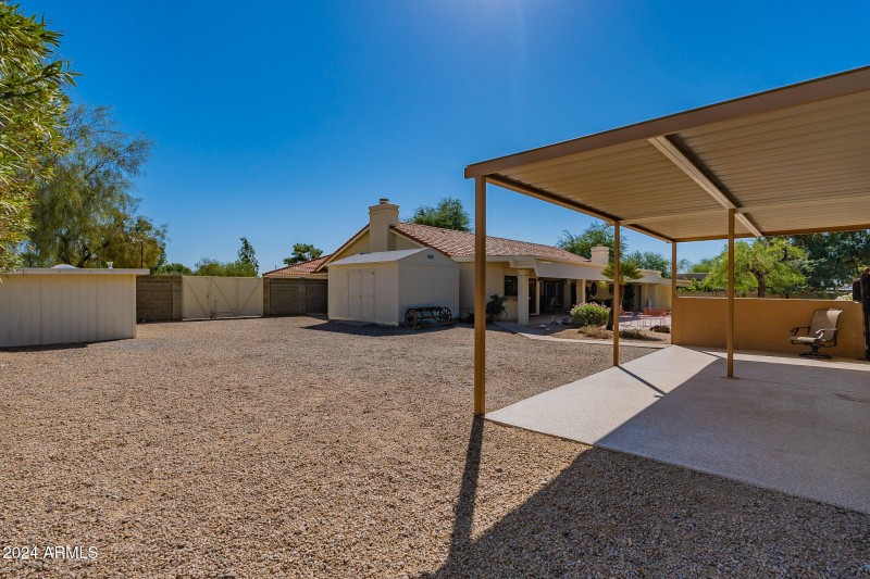 RV Gate with Storage Sheds